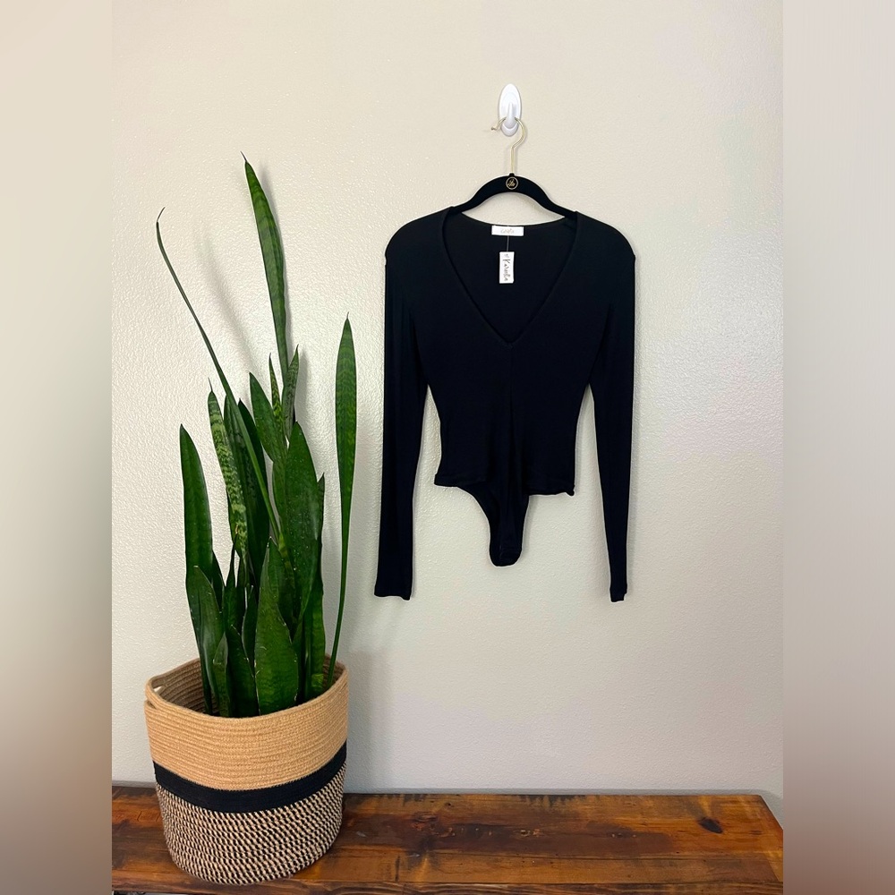 Black V-neck bodysuit